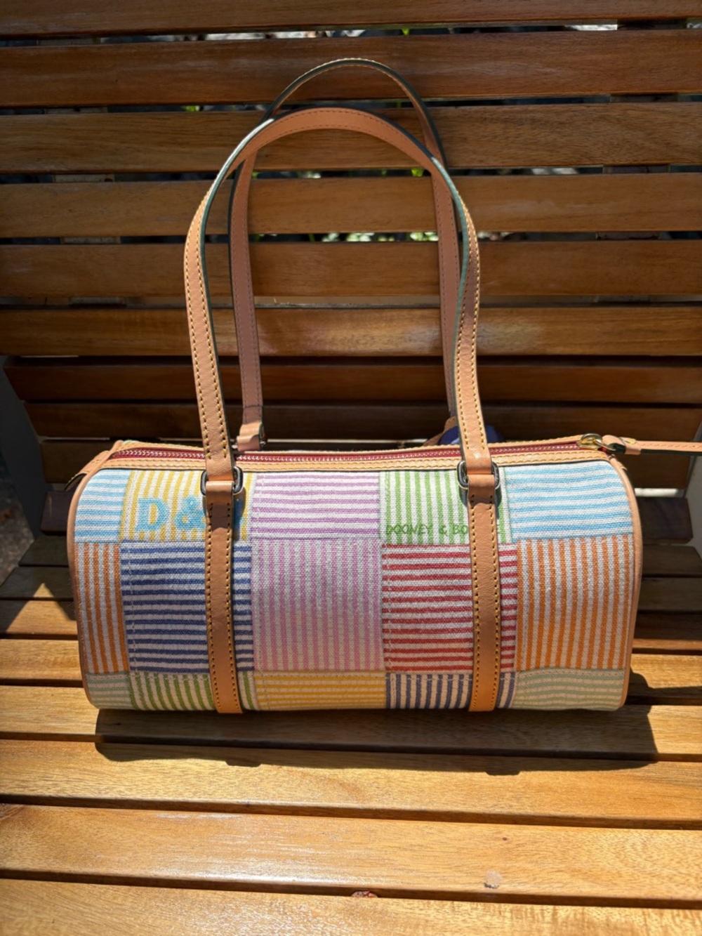 Dooney & Bourke Multicolor Striped Patchwork Crossbody Barrel Bag with Tan Trim